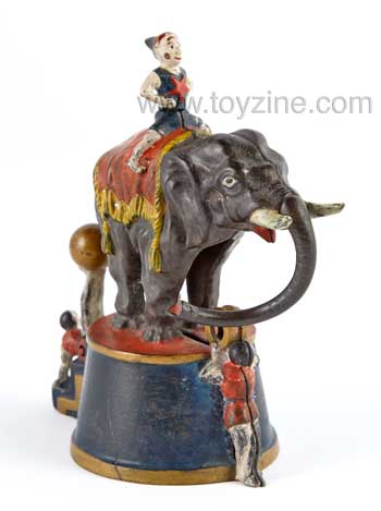 Elephant and Three Clowns Cast Iron Mechanical Bank J & E Stevens Co. Pull the clowns leg and the elephants trunk