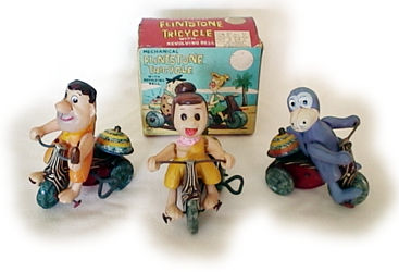 Flintstones tin toy clockwork tricycles.