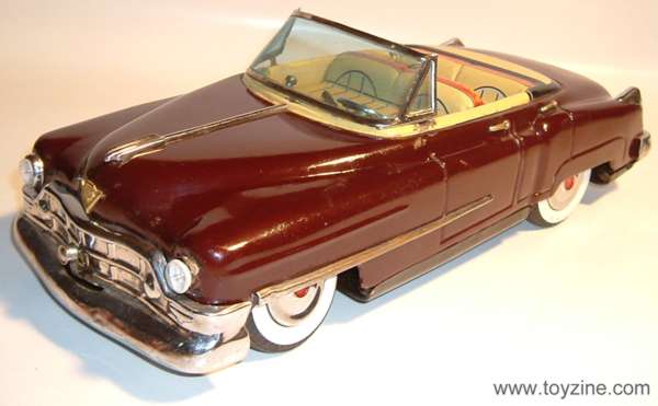 CADILLAC - TIN - Battery operated, working head light, made in Japan by T.N in 1950's